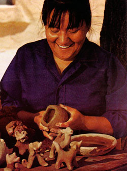 Margaret (b.1936) and Luther (1911-1987) were the children of Lela and Van Gutierrez. Working together, the siblings continued the polychrome style of painting begun by their parents. No other potter at Santa Clara used the mixture of natural colors in their pottery. Colors ranging from tan, red, green, blue, gold, black and white used in this wedding vessel were all obtained from natural pigments.