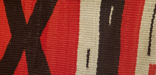 Close up view of a section of this textile.