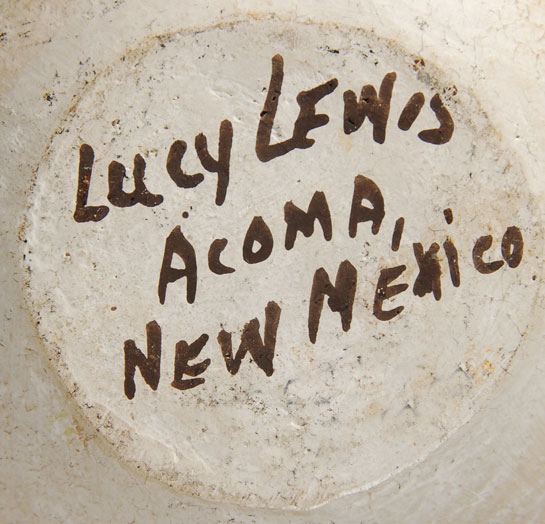 Those who knew Lucy Lewis, or at least are familiar with her pottery, will recognize this Black-on-white designed jar with the fine-line pattern as one of her personal favorite designs and a favorite of many collectors.  This has to be the most difficult design to execute.  Each line of the design has to be straight and parallel to the adjacent lines and each must end in the appropriate length in order to intersect with the lines in the opposite direction.  Vertical lines intersect with horizontal lines in perfect synchronization.  There could not be a more taxing design to apply.  As is traditional, the jar was constructed of native Acoma clay and hand coiled, then sun-dried and sanded to a smooth surface, after which a white slip was applied to the entire vessel and polished to a high sheen. The design was painted over the slip, and the vessel was then fired.  Condition: The jar is in original excellent condition.  Provenance: From a Santa Fe family  Recommended Reading: Acoma and Laguna Pottery by Rick Dillingham 