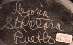 Artist Signature - Legoria Tafoya, Santa Clara Pueblo Potter