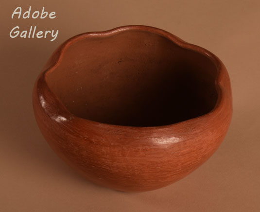 Alternate view of this polished red pottery bowl.
