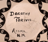 Artist Signature of Lucy Lewis, Acoma Pueblo Potter.