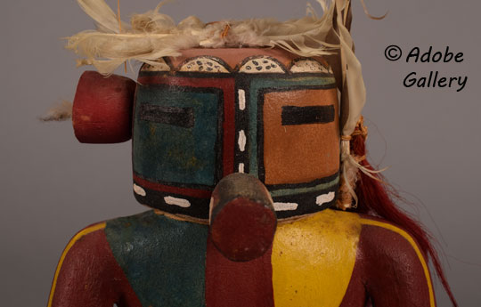 Close up view of the face of this Katsina doll.