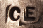 Hallmark Initials of artist Chavis Elliott, Diné Jeweler