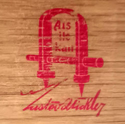 The Gustav Stickley red decal Als lk Kan Gustav Stickley with joiners compass is stamped on the interior of a drawer face.