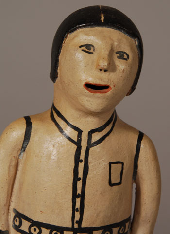 This standing male figurine originally had the artist’s name in pencil but it is too faint to read.  The only readable part is the date 1971.  It is possibly by Felipa Trujillo, an assumption based on the style of hands and the eyes.  Babcock states that Trujillo began making storyteller figurines in the mid-1960s.  We know that Cordero made the first one in 1964, so Trujillo must not have been far behind her.  Trujillo was one of the seven artists represented in the Museum of International Folk Art exhibit "What is Folk Art?" in 1973.  It seems fairly obvious that Trujillo was one of the earliest potters to make storyteller figurines.  Before storyteller figurines, Trujillo was making other figurines, both human and animal, so it is not unlikely that this male figurine could be one of her creations.  Condition:  the figurine is in original condition  Provenance: from the collection of Katherine H. Rust  Recommended Reading: The Pueblo Storyteller by Barbara A. Babcock 