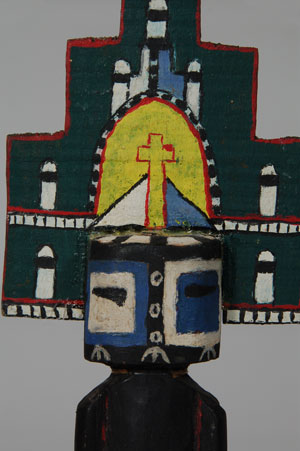 The Hemis Katsina is probably the most beautiful and best known of all Hopi Katsinas. His elaborate headdress, called a tableta, is partly responsible for his beauty. His body is painted with black corn smut with light colored half-moons on the chest. He wears a kilt over which hang evergreen boughs. A Douglas fir ruff is wrapped around his neck. The tableta is painted with phallic and cloud symbols and capped with feathers. He appears in the Home Dance or Niman Ceremony. No other katsina, neither clowns nor side dancers, appears with the line of Hemis except the Hemismana.  It is interesting to note that at Hopi, they refer to the Hemis Katsina as having come from the Rio Grande Jemez Pueblo of New Mexico. At Jemez Pueblo, they refer to a similar dance as a Hopi dance.  This representation of a Hemis Katsina is a contemporary carving from the last 20 years or so but made in the likeness of an earlier katsina doll.  It is nicely rendered and in very good condition.    Provenance: from a gentleman in California.  Recommended Reading:  Following the Sun and Moon: Hopi Kachina Tradition by Alph Secakuku 