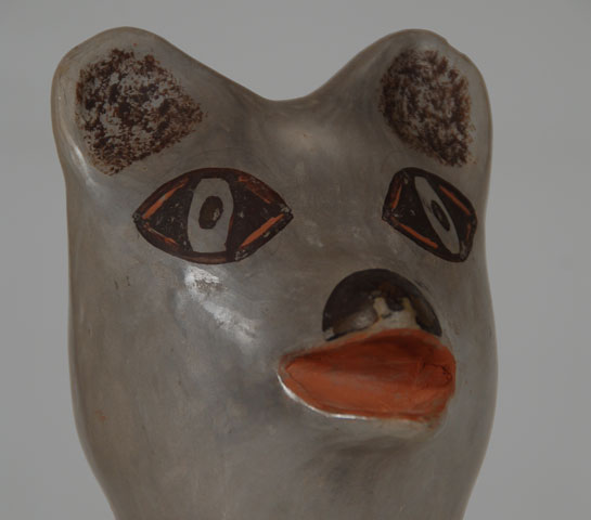 Agnes is a daughter of Pauline Setalla and niece of Eunice Navasie.  According to her, she started making pottery in the mid-1970s using the Featherwoman-style white slip, which was used on this bear vessel, and later switched to the more traditional style of using no slip.    This bear vessel is probably from her early period in the mid- to late-1970s and is signed with the name Agnes S.  The head of the bear is removable.  Condition: original condition except for a chip on the bear’s right rear foot and some minor slip abrasion  Provenance: from the collection of Katherine H. Rust  Recommended Reading: There is a biographical statement by the artist in Hopi-Tewa Pottery 500 Artist Biographies by Gregory Schaaf. 