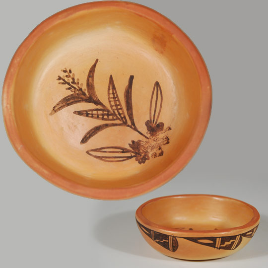 Since Nampeyo of Hano's era of making pottery at Hopi House at The Grand Canyon, the Hopi have made small souvenir pieces for tourists. This small bowl is typical of such items. It was as carefully made and as carefully decorated as any major piece of pottery. The interior of the bowl is decorated with a full corn plant with developed ears of corn. The exterior is designed with a series of clouds. On the bottom is written, in pencil, Trading Post Second Mesa Hopi Res. Ariz. 200 Jan 22, 1963.   Condition: very good condition Provenance: from the collection of Jeffrey Trent of Nevada