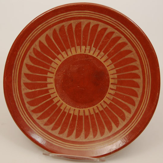 Red ware by Maria Martinez is among the rarest of all pottery she produced. Black ware was so popular with collectors that she rarely fired any red ware. Early pieces like this one by Maria and Santana, produced shortly after Julian passed away, also are rare-maybe even rarer than pieces by Maria and Julian.   Condition: This piece is in very good condition, but does exhibit some scratches and abrasions as would be expected on a piece that is over 50 years old. Provenance: from the estate of Michael Frost Recommended Reading:  The Legacy of Maria Poveka Martinez by Richard Spivey