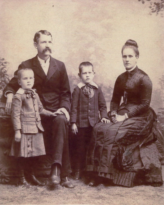 I have attached a photo of my Great Grandfather [see below].  He is posing with his wife, Mary (Finney) Morton, my grandfather on the left (Carl Willison Morton) and his son (James Ralph Morton).  His name was William Walker Morton II.  The photo was taken in 1887 in Washington, PA.  He was living in Upper Buffalo, PA at the time. He was a Presbyterian Minister and did extensive traveling throughout the US from the 1880s to the early 1900s.  He was born on June 27, 1846 and died on March 1, 1927.  The figurine was made for him in his likeness.  I understand he wore the minister's frock on his travels. -Don Morton