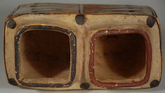 It has  remained a mystery as to the use of these rectangular pottery boxes but it is generally thought there might have been a ceremonial purpose, perhaps for use in kiva ceremonies.  The jar has been identified to circa 1880 by Francis Harlow.  The two chambers of the box are divided by a wall so each chamber serves an independent purpose.  On one side of the wall of the vessel, a red rim coordinates with a red wall design while a black rim coordinates with a black wall design.  On the opposite side of the vessel, a red rim coordinates with a black design and a black rim coordinates with a red design.  The designs on the ends of the vessel are the same.  Six black dots rest on the shoulder of the box and each of the wall designs has black dots capping the triangular design.  Condition: excellent condition. Provenance:  published in the book Modern Pueblo Pottery by Francis Harlow, p 93.  Harlow sold the box to pottery collector Larry Frank who eventually sold it in 2000 to Dr. Allan Cooke, co-author of the book Canvas of Clay: Seven Centuries of Hopi Ceramic Art, from whose collection it is now available. Recommended Reading:  Canvas of Clay: Seven Centuries of Hopi Ceramic Art by Edwin L. Wade and Allan R. Cooke 