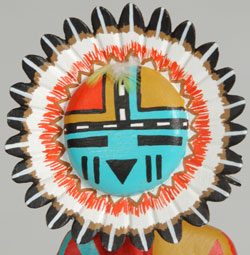 close up view of the face of the kachina