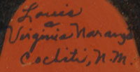 Signature of artists Louis and Virginia Naranjo