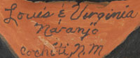 Signatures of artists Louis and Virginia Naranjo