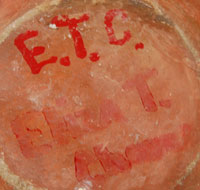 This small chile bowl is a good example of one that was used extensively at a pueblo table and at communal events.  It has the initials E.T.C. painted on the underside in red paint.  Those are the initials of the owner of the bowl and not necessarily the maker of the bowl.  Initials like those are put on bowls that are going to be used for serving food at communal cerebrations.  The purpose is to insure the return of the bowl following the event.