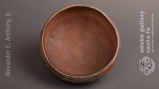 Inside of this Isleta Pueblo Polychrome Small Serving Bowl