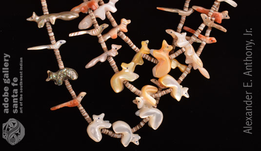 Close up view of some of the 75 fetish carvings in this Zuni Pueblo Necklace.