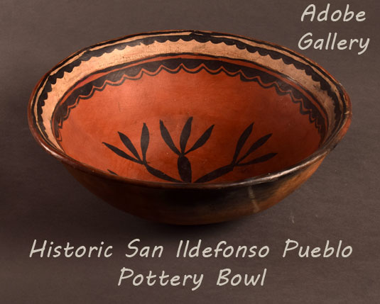 Alternate side view showing the bowl shape and designs.