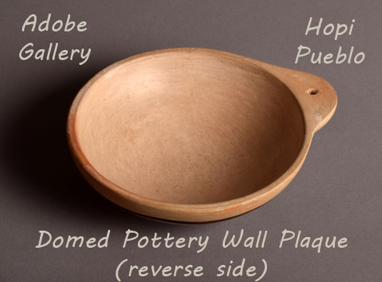 Alternate view showing the other side of this pottery vessel.