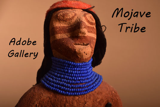 Close up view of the face of this Mojave pottery figurine.