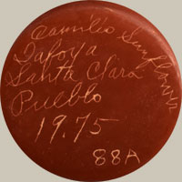Artist signature of Camilio Sunflower Tafoya, Santa Clara Pueblo