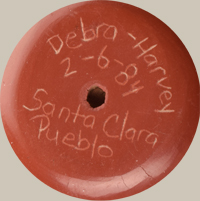 Debra Trujillo (1955- ) signature - Debra Trujillo started collaborating with Harvey Chavarria in the early 1980s, until his death in 1991. An example of this collaborative signature is to the right (Debra - Harvey).