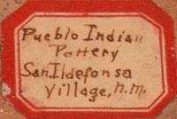 An old eight-sided paper label on the underside of the vessel, written in beautiful old script, reads “Pueblo Indian Pottery San Ildefonso Village, N.M.” The vessel dates to the early 1900s.