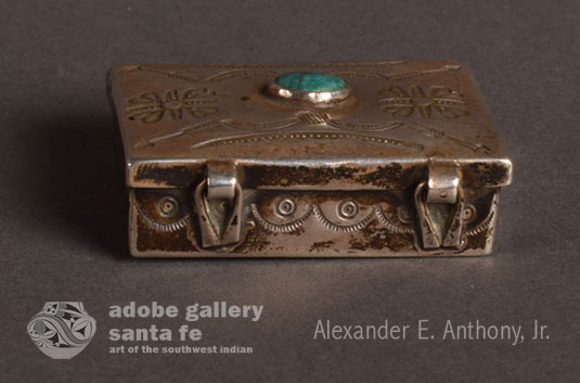 Alternate view of the back of this silver box showing the hinges.