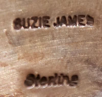 Artist hallmark signature - Suzie James, Diné Artist