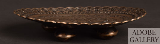 This heavy gauge sterling silver oval tray is mounted on four hand made balls for legs. 