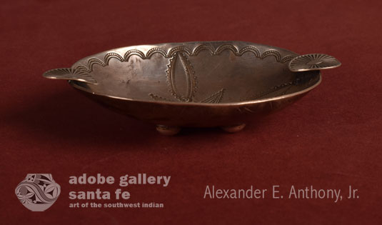 Alternate view of the side of this silver dish.