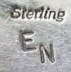 Artist Hallmark initials - Elvis Nelson, Diné Silversmith