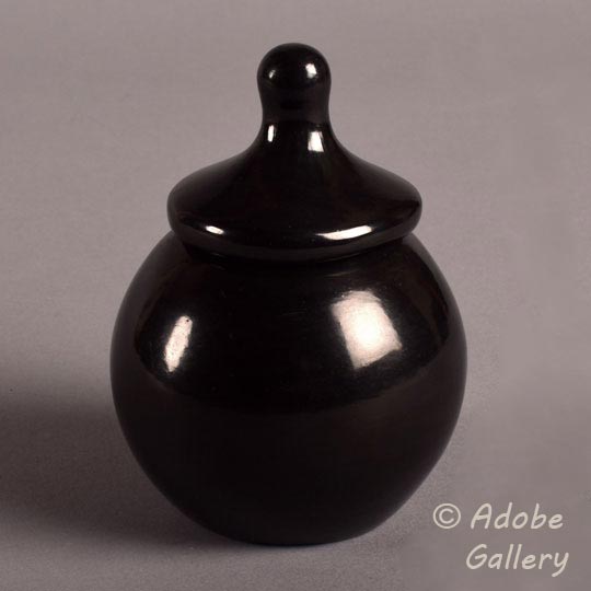 alternate close up view of this lidded jar.