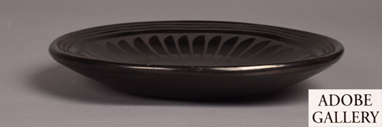 Alternate side view of this blackware plate.