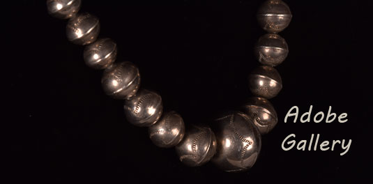 Close up view of the stampwork on the silver beads. Close up view of the stampwork on the silver beads.