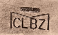 The band is stamped CLBZ under a large wide M, a hallmark first used in 1977 by Mitchell Calabaza of Kewa Pueblo. 