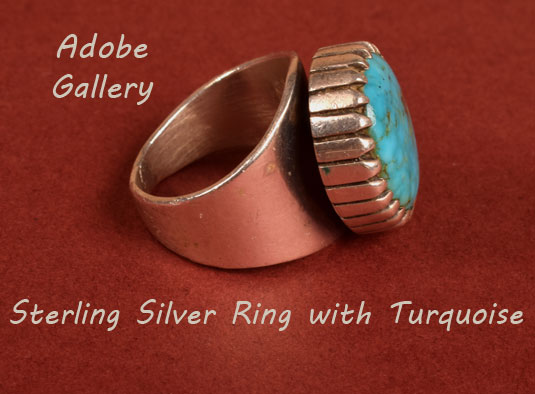 Alternate side view of this silver and turquoise ring.
