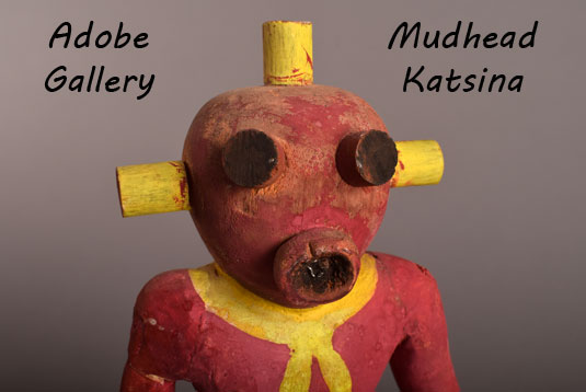 Close up view of the face of this mudhead Katsina doll.