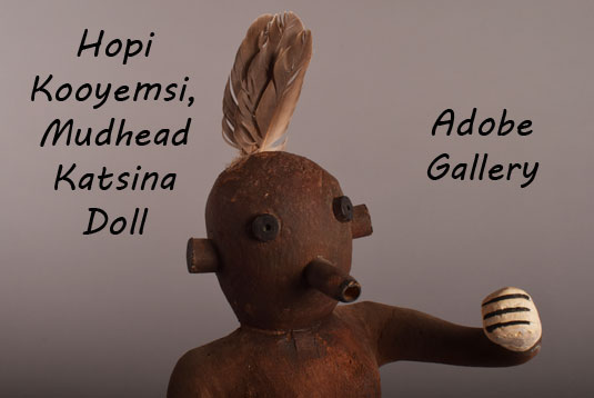 Close up view of the face of this mudhead Katsina doll.