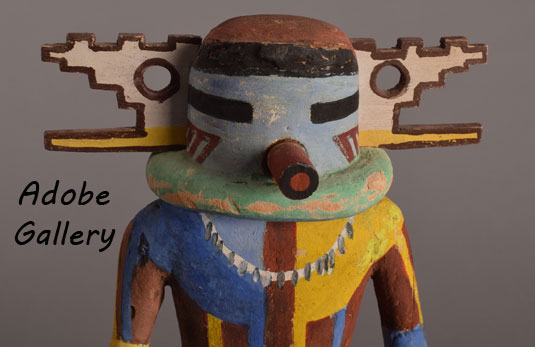 Close up view of the kachina doll face.
