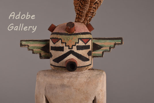 Close up view of this Kachina doll face.