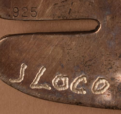 The pin is stamped J. Loco on verso. It also has the silver purity stamp of .925