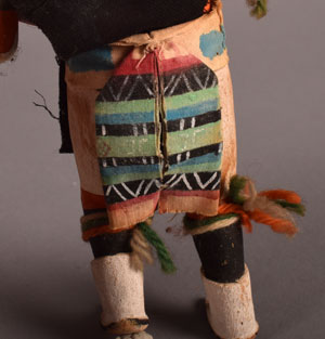 The painted sash under the black loin cloth on the back of the dancer is painted fabric.