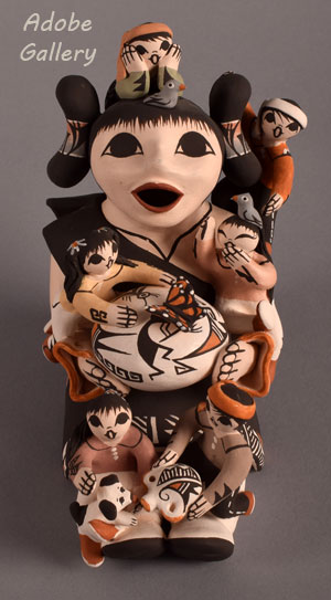 Alternate view of this storyteller figurine.