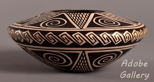 Alternate side view of this Hopi-Tewa Seed Jar by Feather Woman.