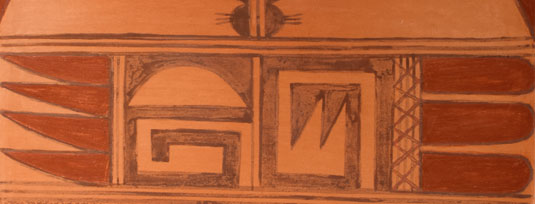 Close-up view of the designs of this pottery tile.