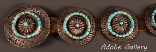 Alternate view showing a close up of 3 conchos including the larger buckle
