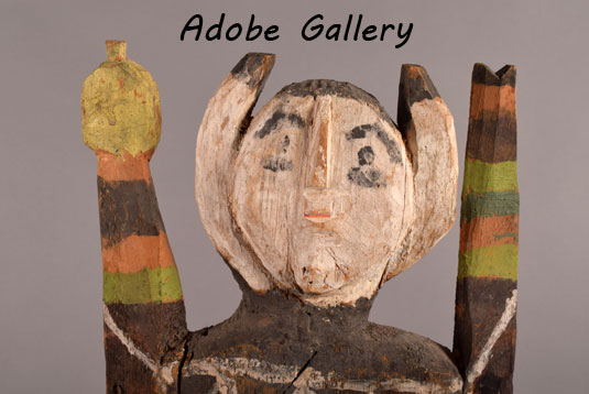 Close up view of the face of this carving. Close up view of the face of this carving.