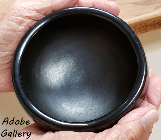 AL Anthony is holding this bowl to show scale and the inside polish.